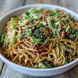 Tossing tender egg noodles with a glossy sweet and savory teriyaki sauce. 
